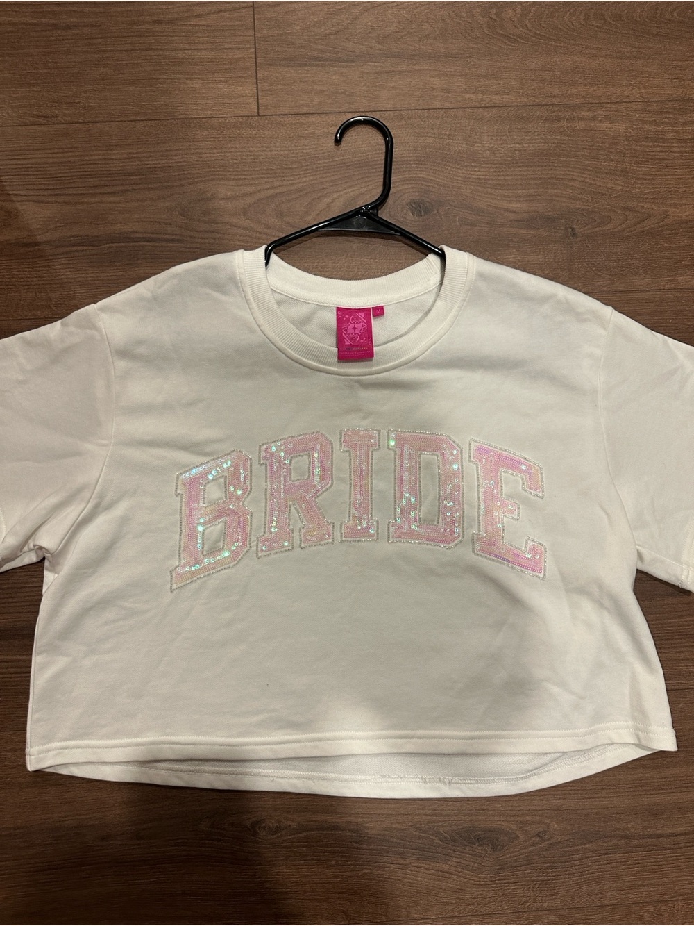 QUEEN OF SPARKLES White Crop Tee with Iridescent Pink 'BRIDE' Sequin Lettering